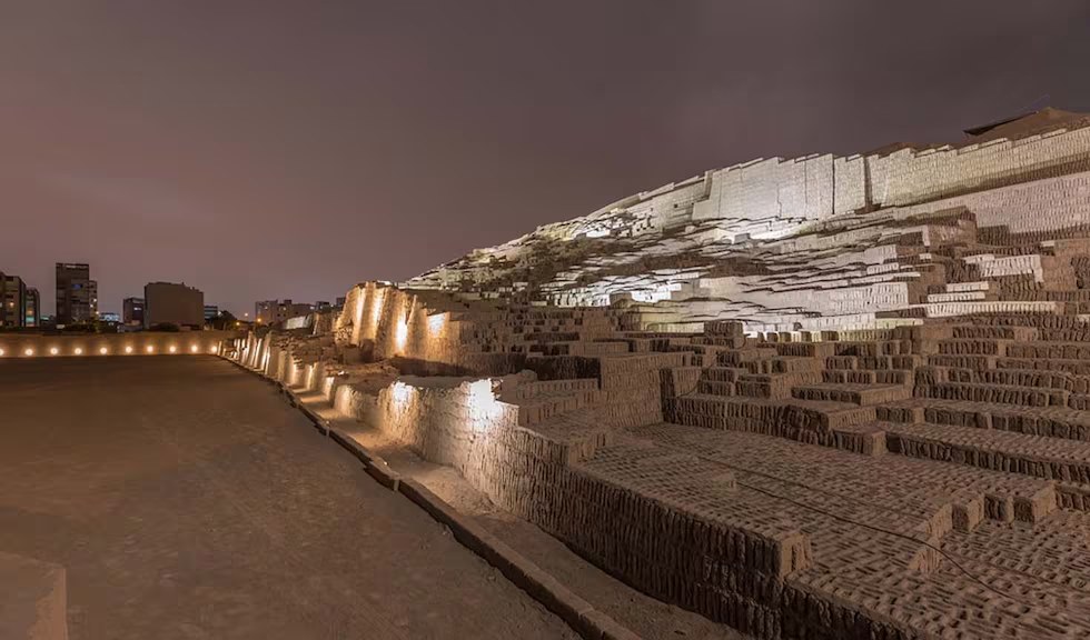 Huaca Pucllana archaeological site illuminated at night in Miraflores, Lima